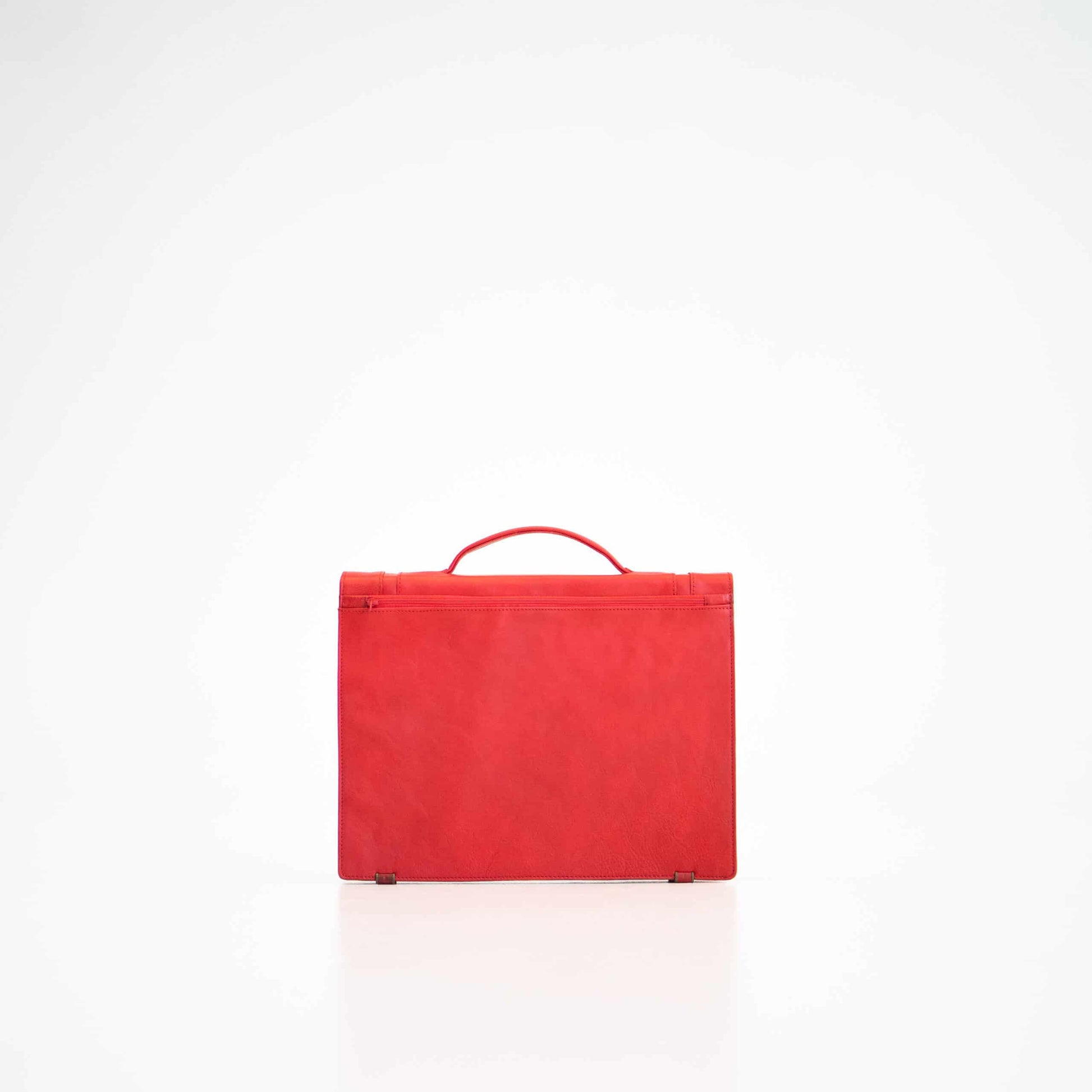 Red genuine leather briefcase with A4 zip pocket, designed for minimalism and functionality, crafted in Estonia