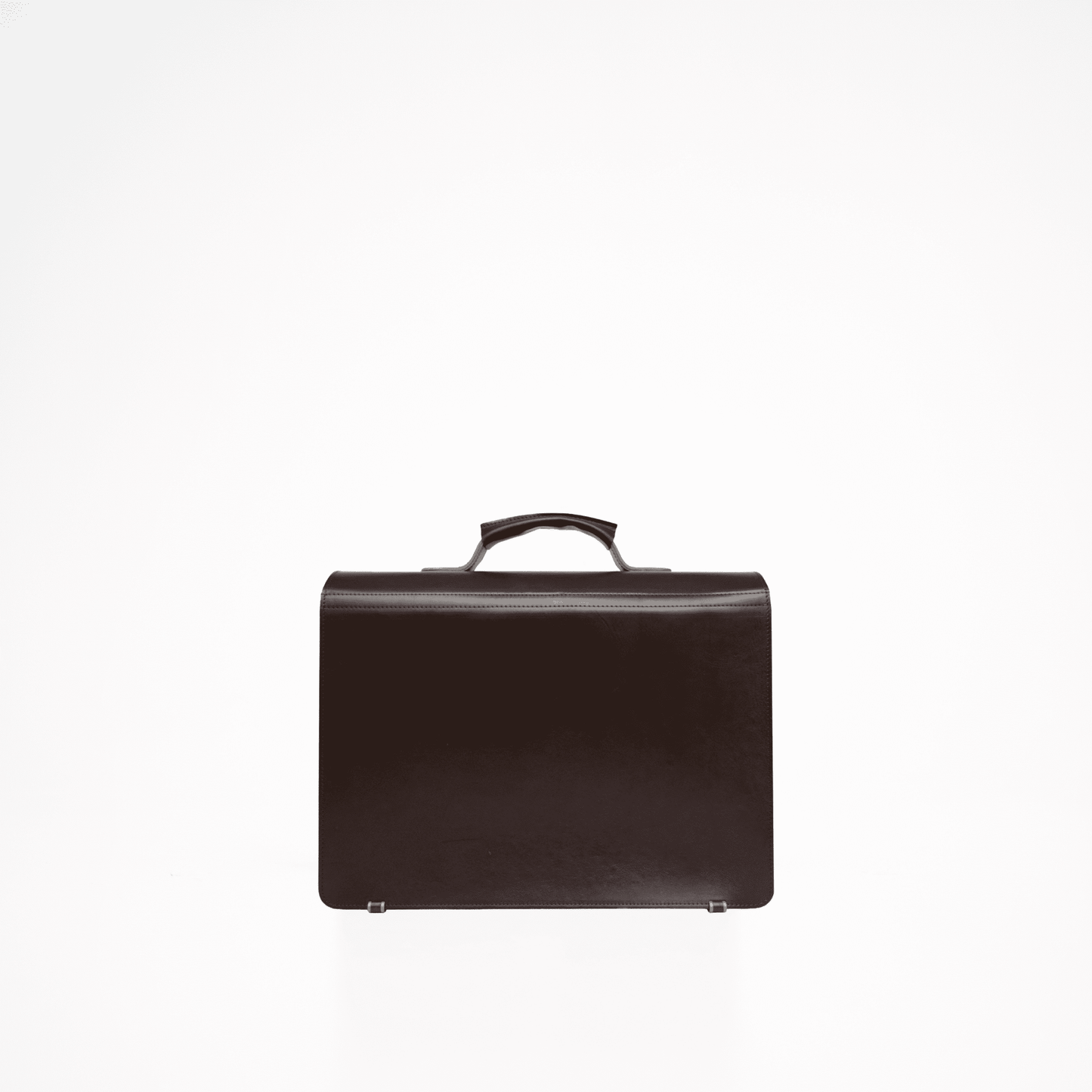 Dark Brown Briefcase No. 35 crafted from thick and durable leather, perfect for laptops and notebooks, showcasing elegant and minimalist design.