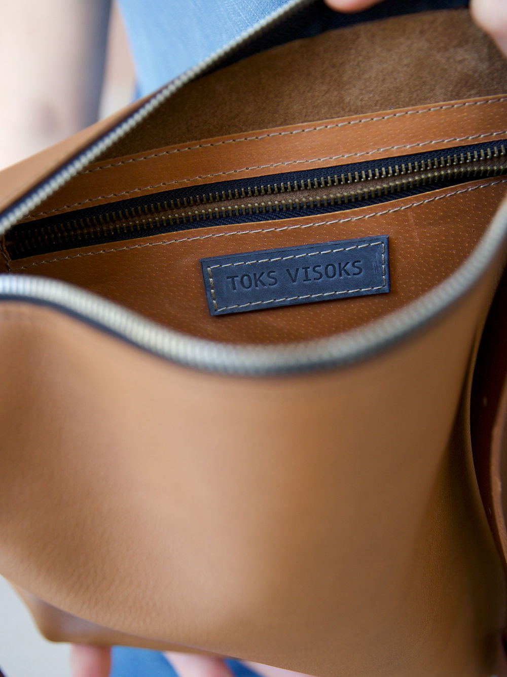 Inside view of ROBIN Leather Handbag Large in Camel Brown with TOKS VISOKS label, available on USMIH Grid for card and Bitcoin payments.