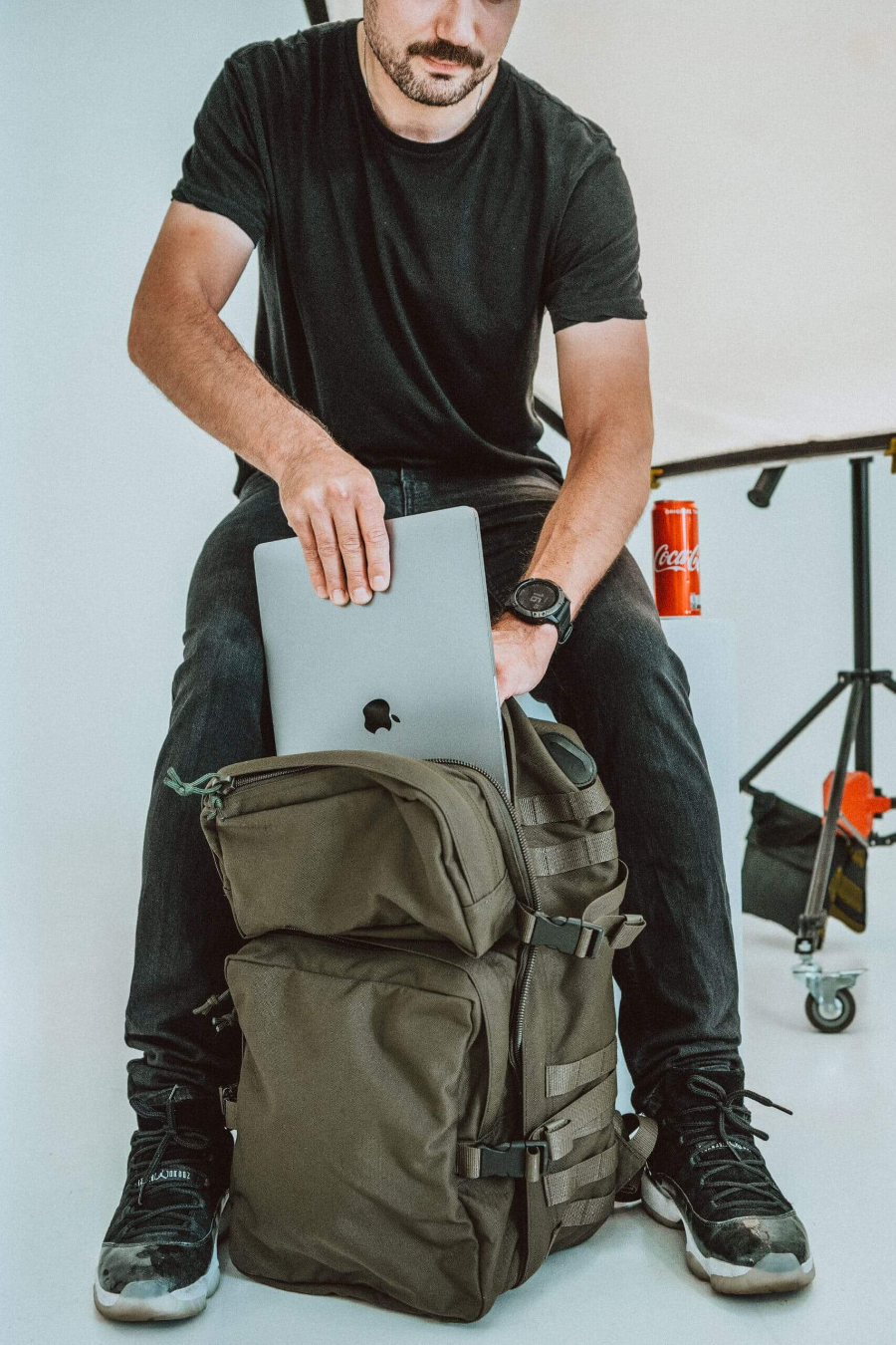 Man with a designer male backpack presented in USMIH online store marketplace for premium, unique gifts, presents and products with option to pay online with cryptocurrency - Bitcoin, altcoins and more, fast shipping across Europe