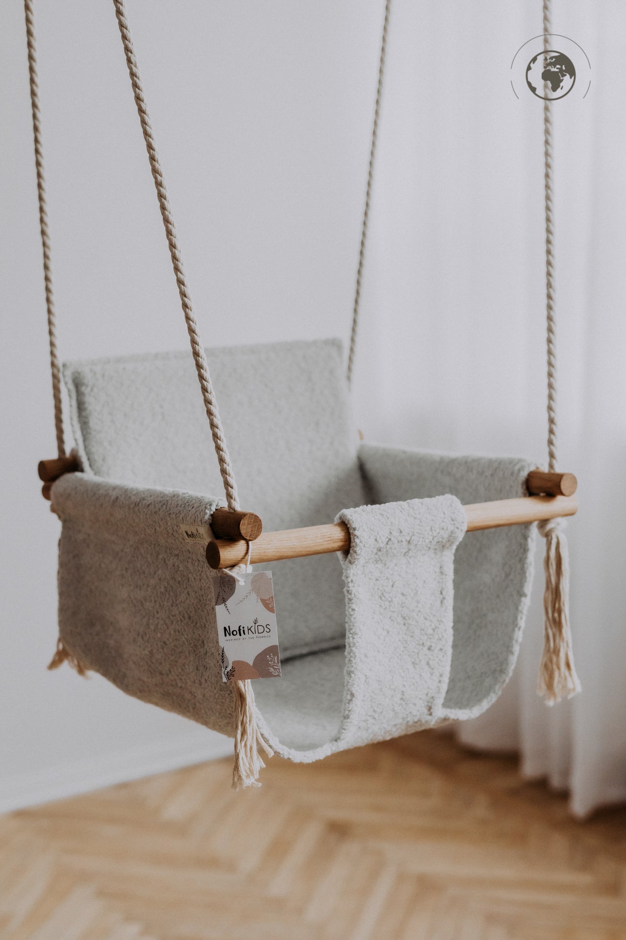 BaBi Baby Swing in Bouclé Ice Grey on USMIH Grid, eco-friendly with oak wood, accepts card and cryptocurrency payments. Perfect for modern homes.