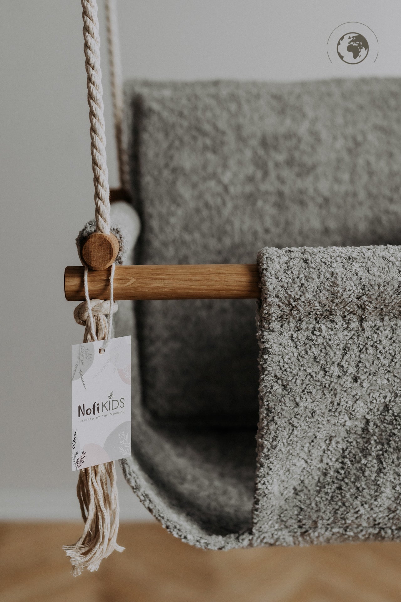 BaBi Baby Swing in Bouclé Stone Grey with oak wood poles, available on USMIH Grid. Purchase using card, Bitcoin, or altcoin payments.