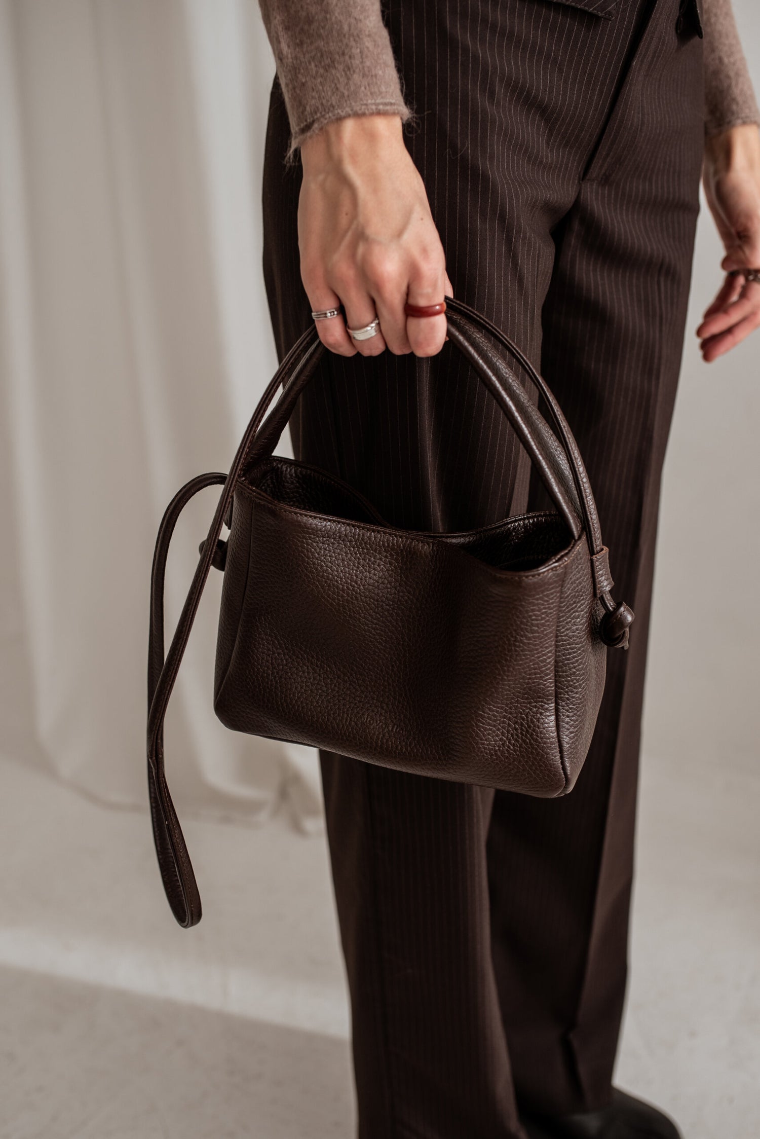 Stylish dark brown Meru crossbody bag with adjustable strap, perfect luxury gift idea from USMIH Buy USMIH.