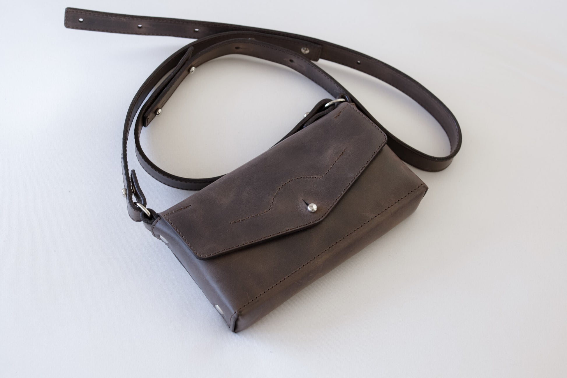 Crossbody Leather Bag KOKUKA - versatile, stylish bag for gifts, travel, or daily use. Unique Soviet-era design, buy at USMIH with crypto.