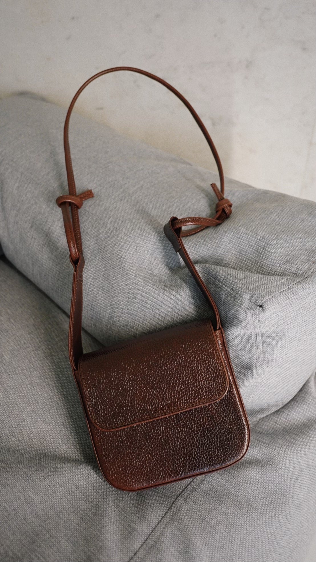 Brown minimalist crossbody bag MUSA with adjustable strap, handmade from Italian leather, stylish gift idea available at USMIH.