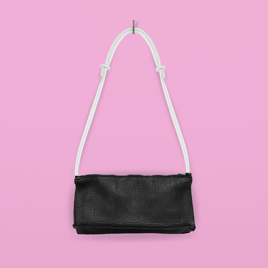 Handmade Leather Bum Bag on Pink Background with Adjustable White Strap, Available on USMIH Grid, Buy with Card or Bitcoin Payments