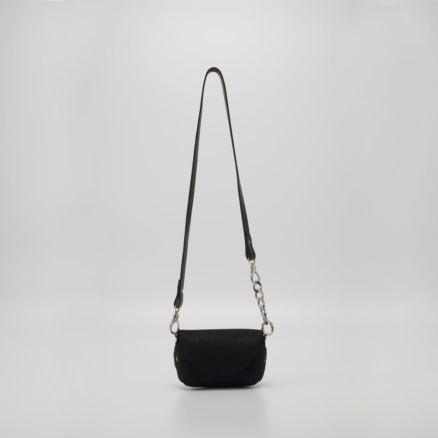 Handmade black leather shoulder bag with silver hardware, available on USMIH Grid. Buy with card, Bitcoin, or altcoin payments.