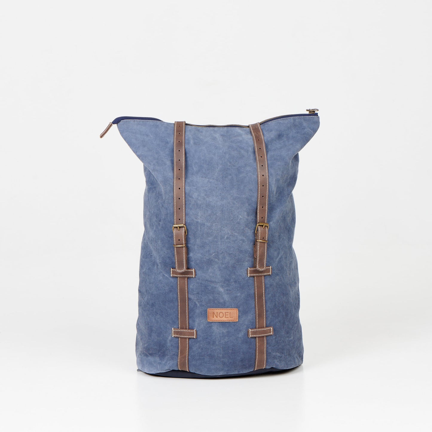 Blue ZIP backpack with leather straps by NOEL, featuring padded laptop compartment and multiple pockets, ideal for USMIH Grid users.