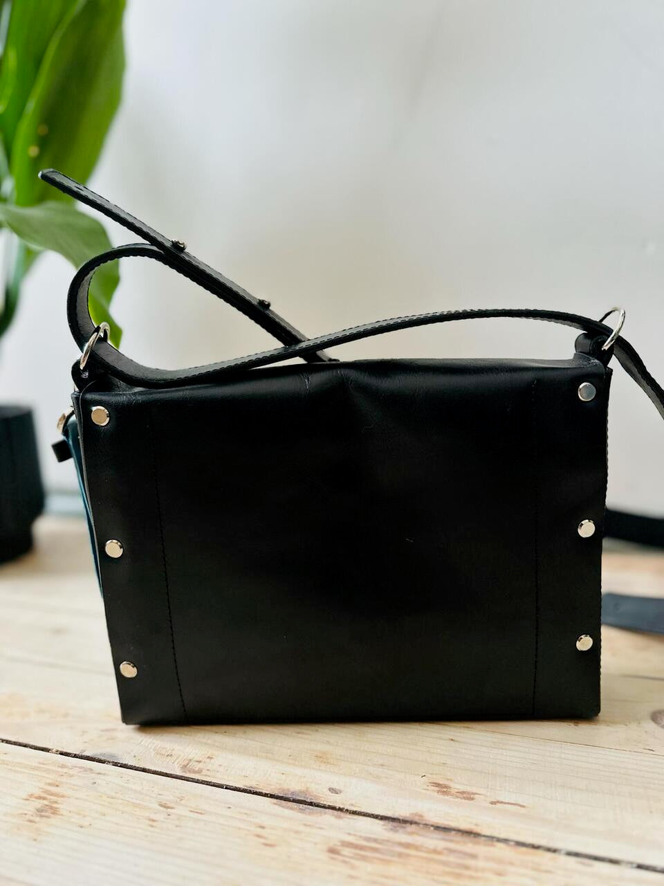 Black Crossbody Leather Bag KOKUKA with adjustable strap, ideal for luxury gift, purchase online with Bitcoin on USMIH Grid.