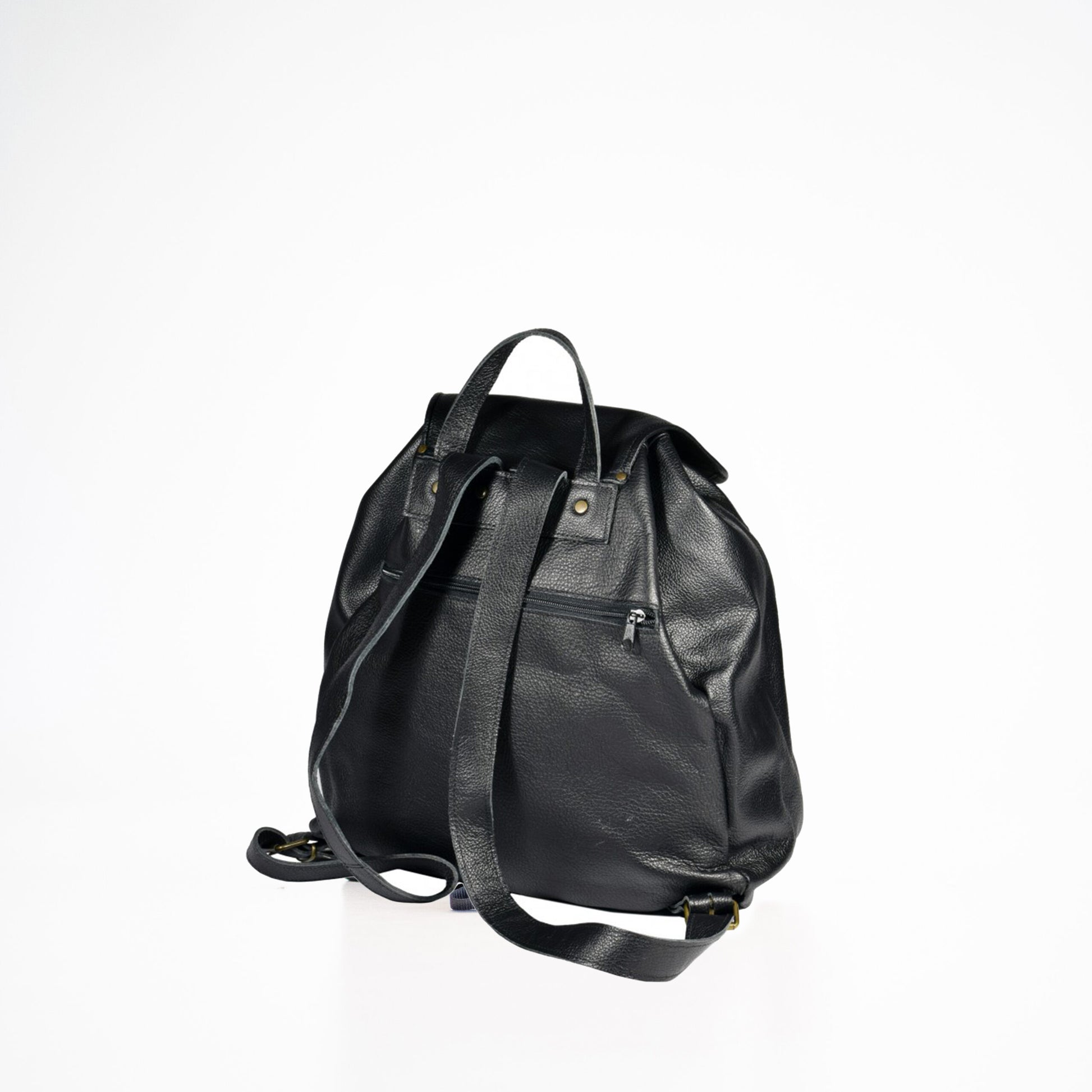 Black handmade leather backpack with adjustable straps, ideal luxury gift for men, available on USMIH Grid.