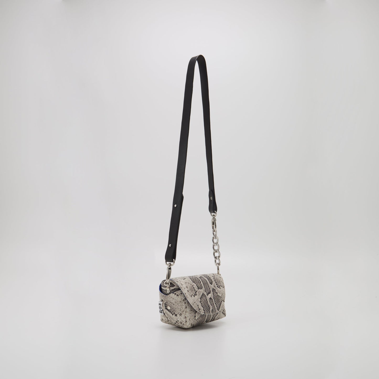 Handmade snake print leather crossbody bag with removable strap on USMIH Grid. Buy with card or cryptocurrency payments.