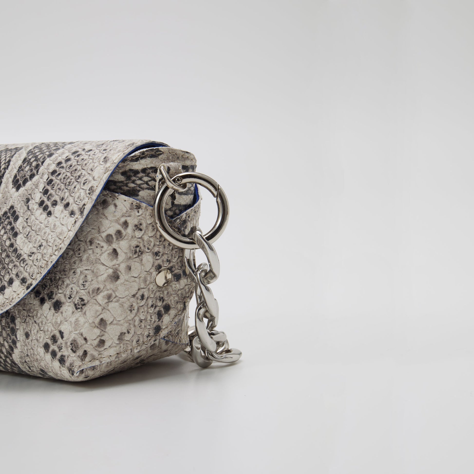 Handmade snake print leather shoulder bag with silver hardware, available at modern USMIH Grid. Buy with card or Bitcoin payments.