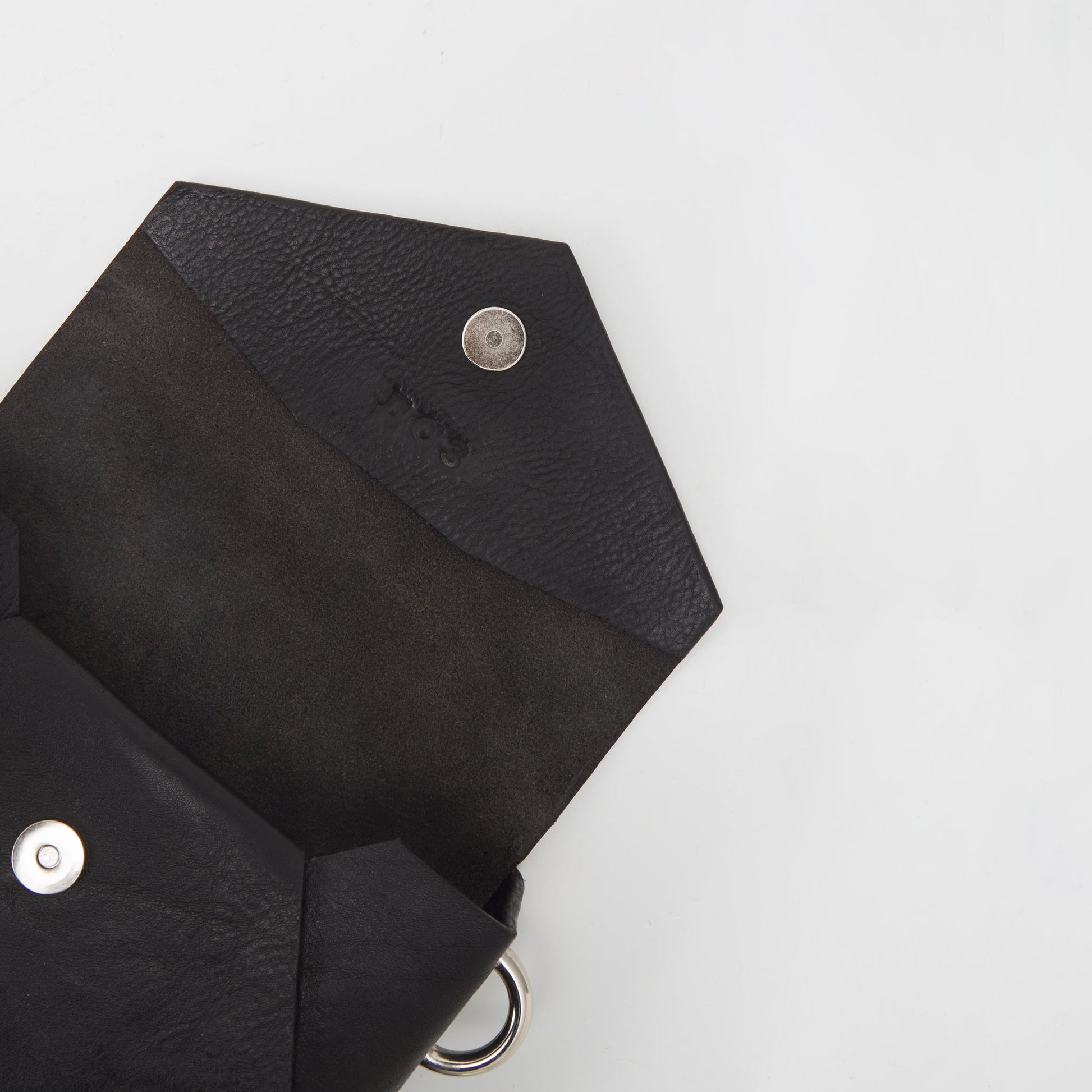 Handmade black leather envelope bag with silver magnet closure, available on USMIH Grid. Pay with card, Bitcoin, or altcoins.