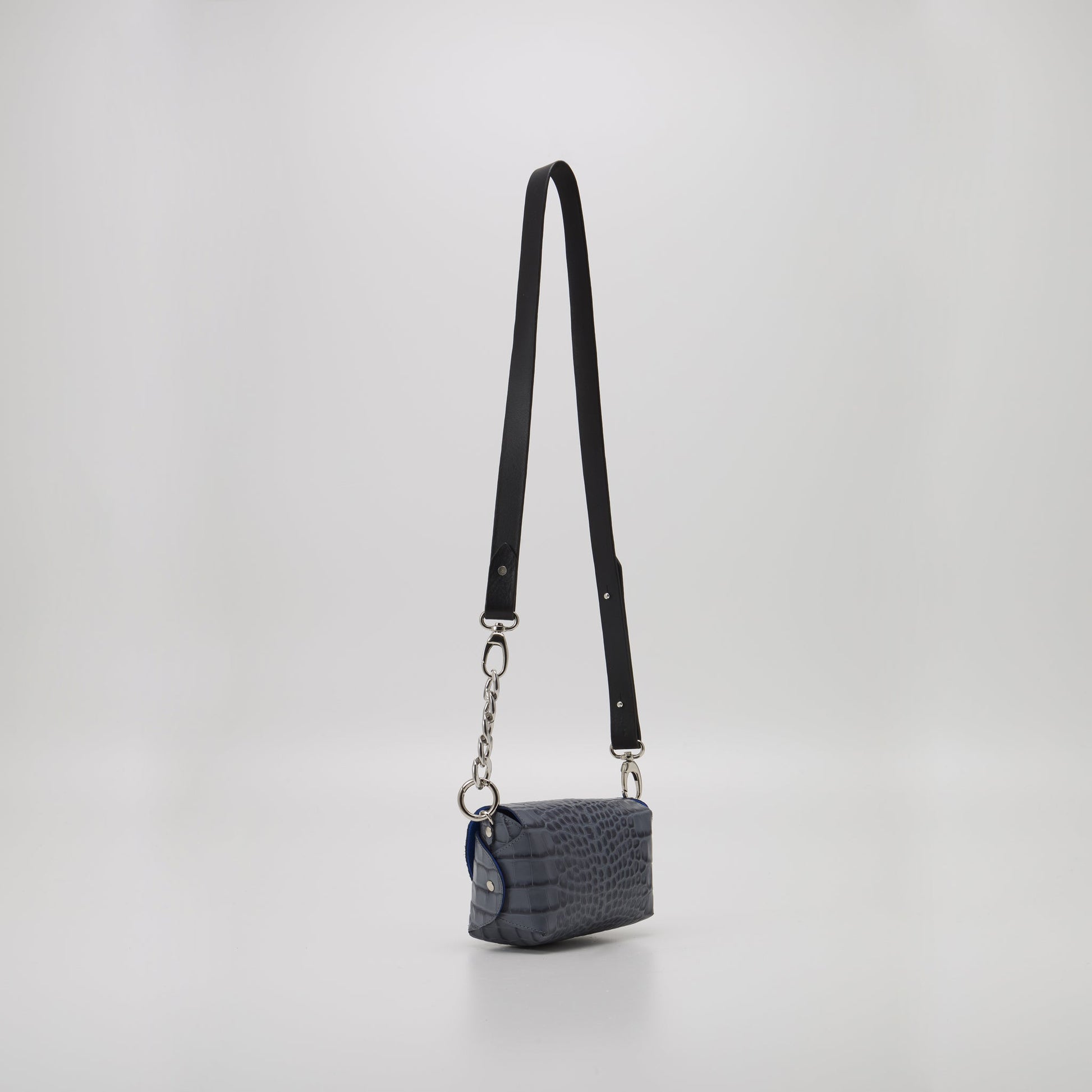 Handmade grey-blue leather shoulder bag with adjustable strap, available on USMIH Grid. Buy with card or cryptocurrency. European brands marketplace.