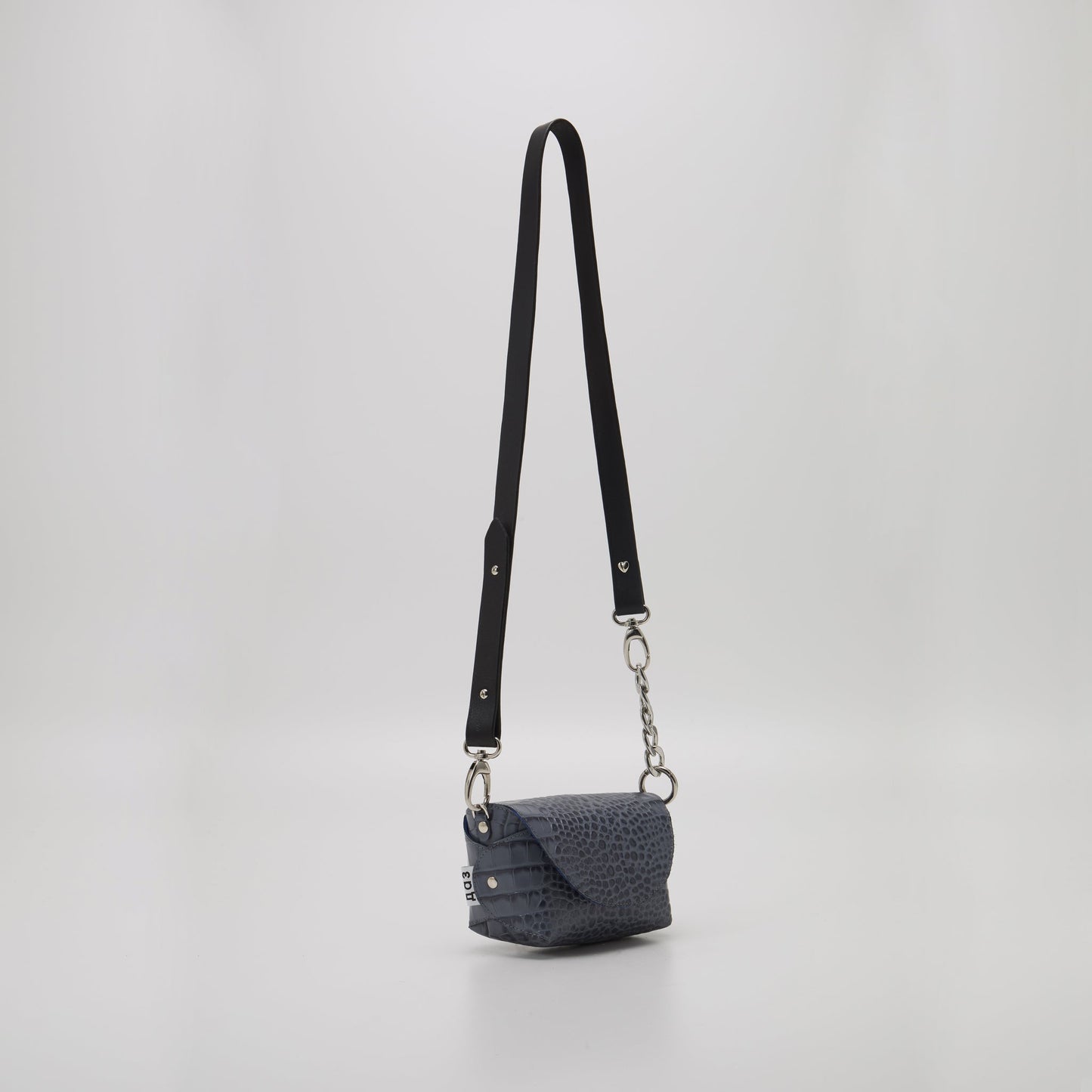 Handmade grey and blue leather shoulder bag with silver hardware, available on USMIH Grid. Buy with card or cryptocurrency.