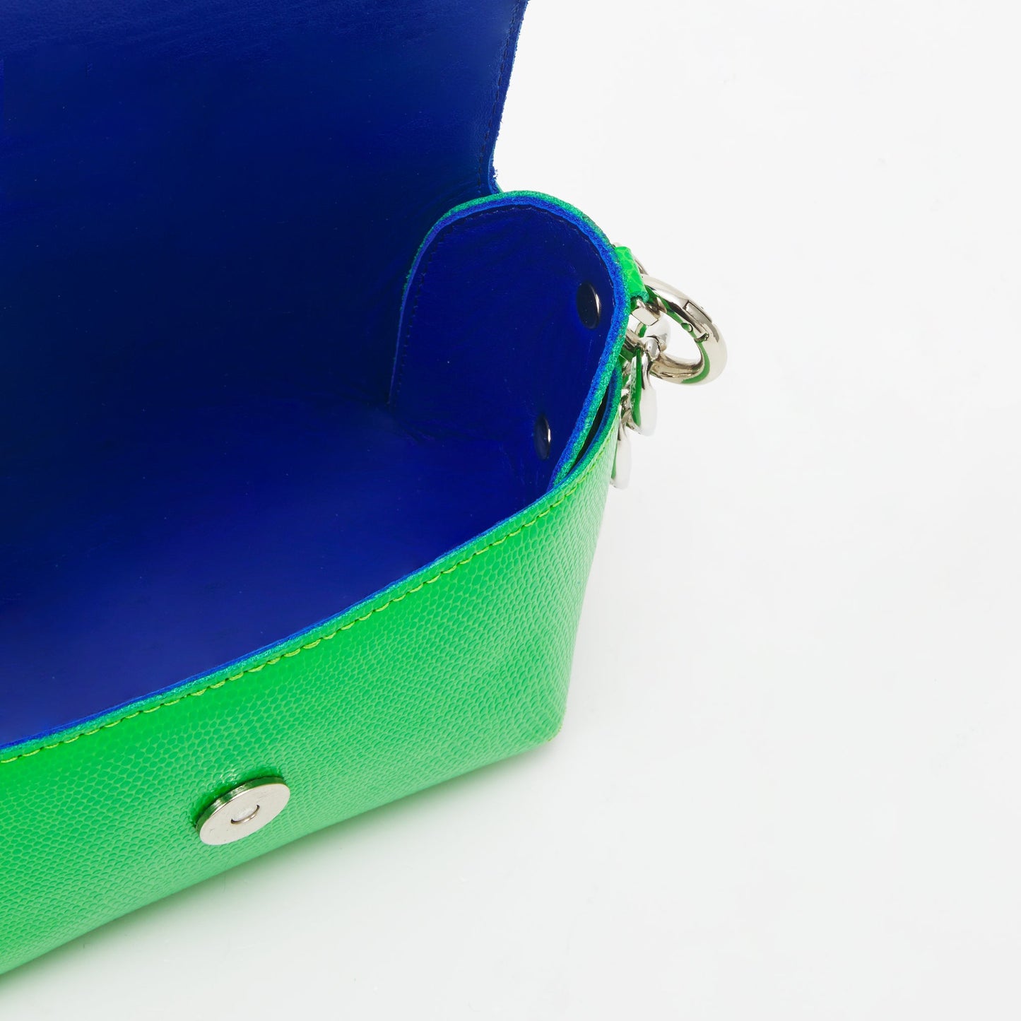 Open neon green leather shoulder bag with blue interior in USMIH Grid store, available for card and Bitcoin payments.