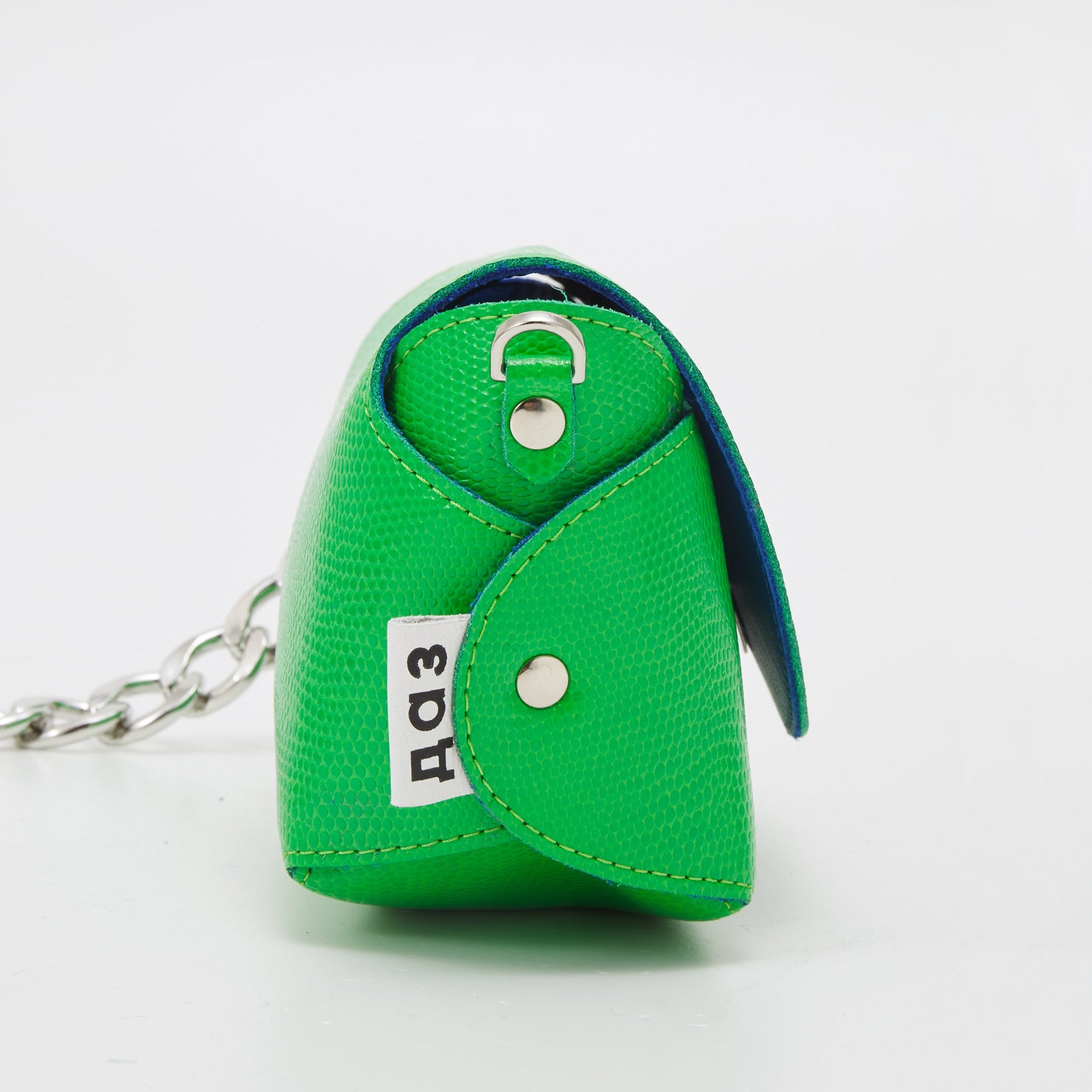 Neon green handmade leather shoulder bag with silver hardware and removable chain strap, featuring USMIH Grid design.